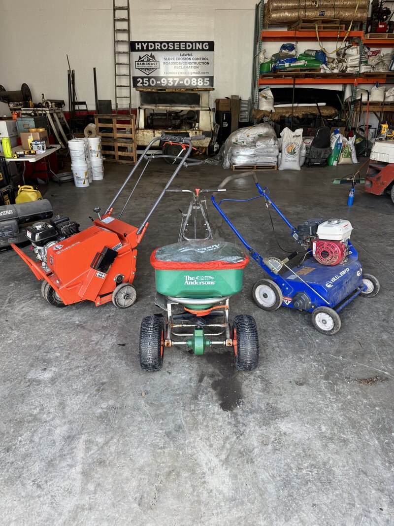 Elite Lawn Care professional equipment — aerator, spreader, and power rake